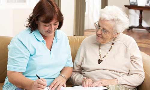an elderly woman and an aged care coordinator talking about the right care