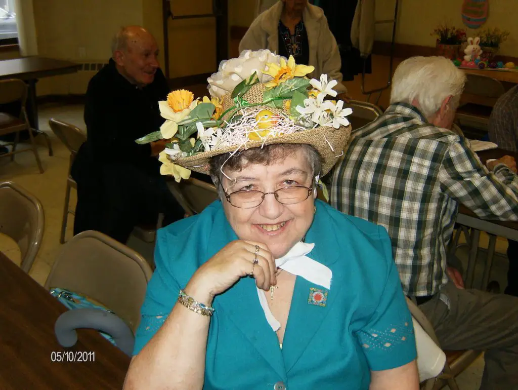 elderly woman wearing Easter Bonnet