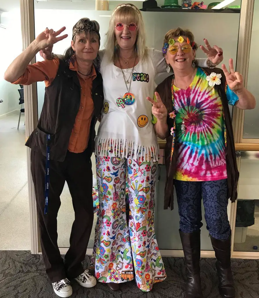 women dressed in theme for the 1960s Hippy Day