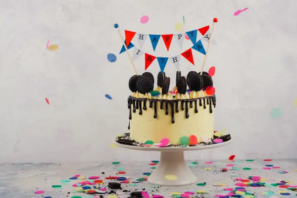 birthday cake with happy birthday banner another idea on Ways To Celebrate Birthdays