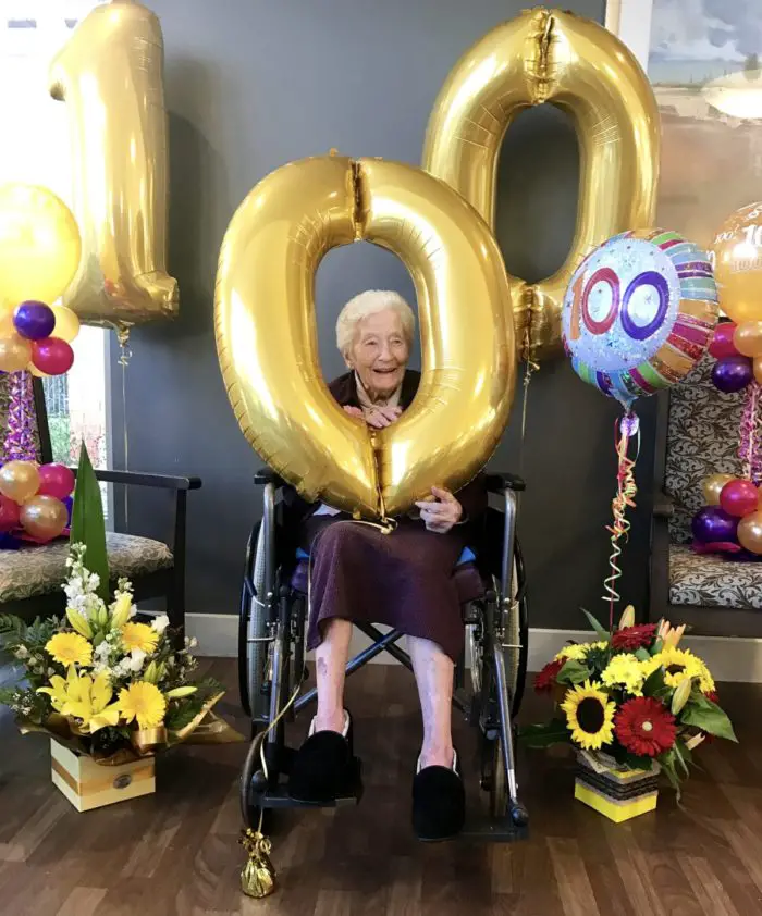 elderly woman celebrating her 100th birthday