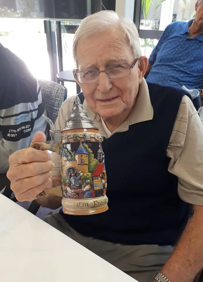 Senior drinking German Beer
