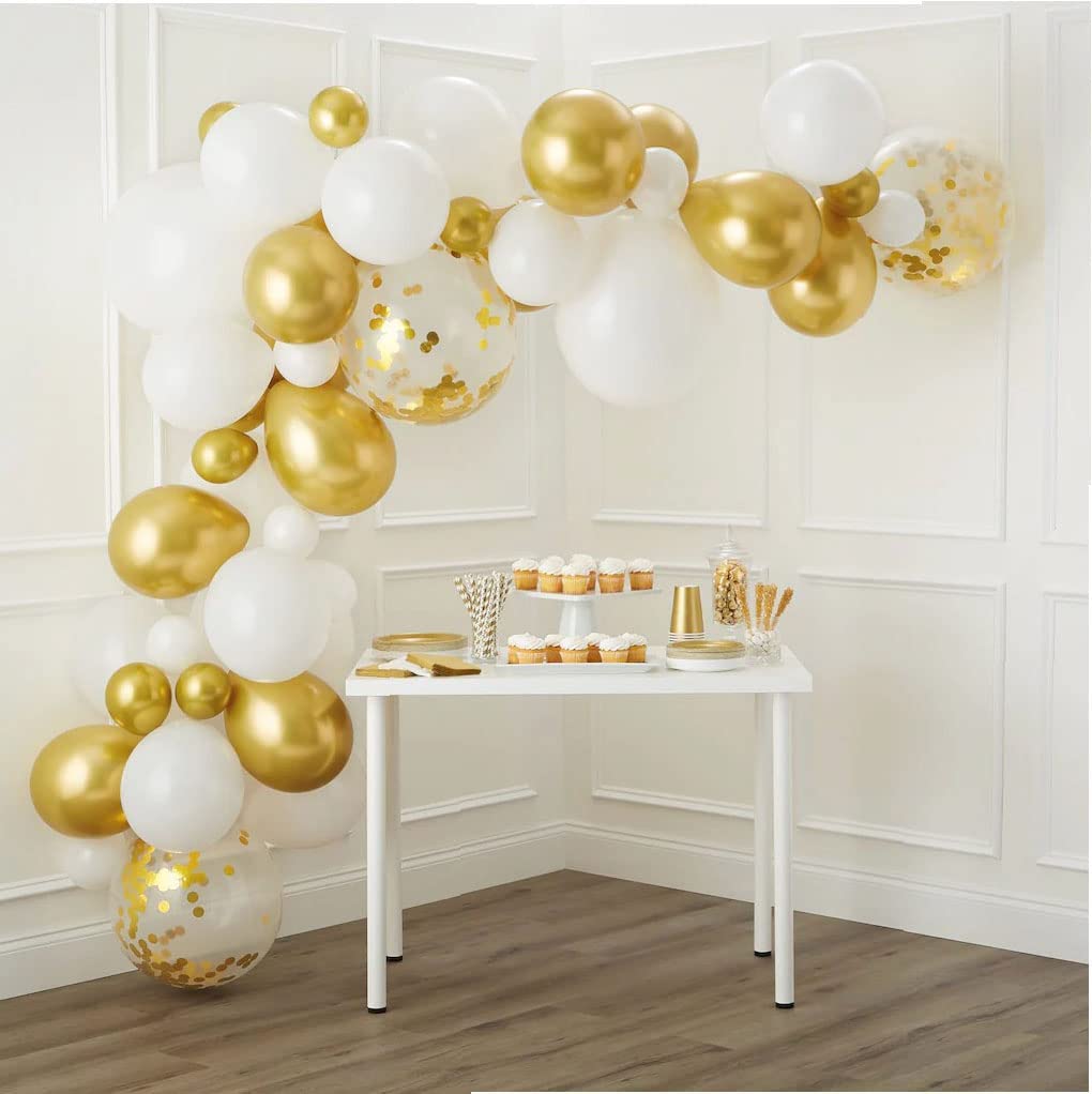 metallic and white balloons and other table decorations 