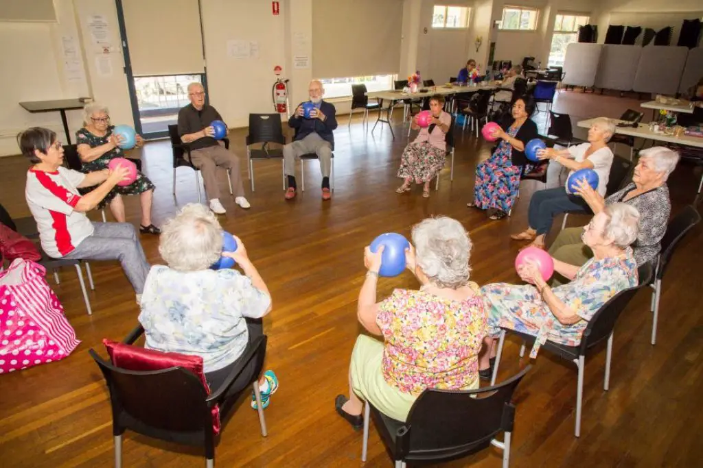 Elderly group doing ball movements