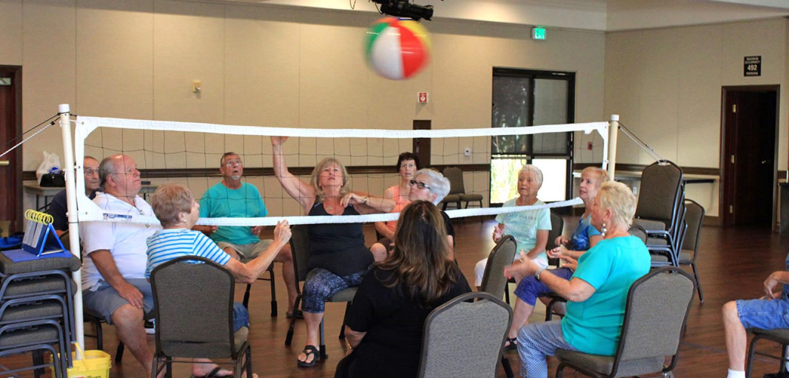 seated-balloon-volleyball-for-seniors-fun-exercise
