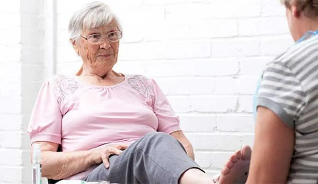 Elderly woman enjoying Foot Spa for Seniors 