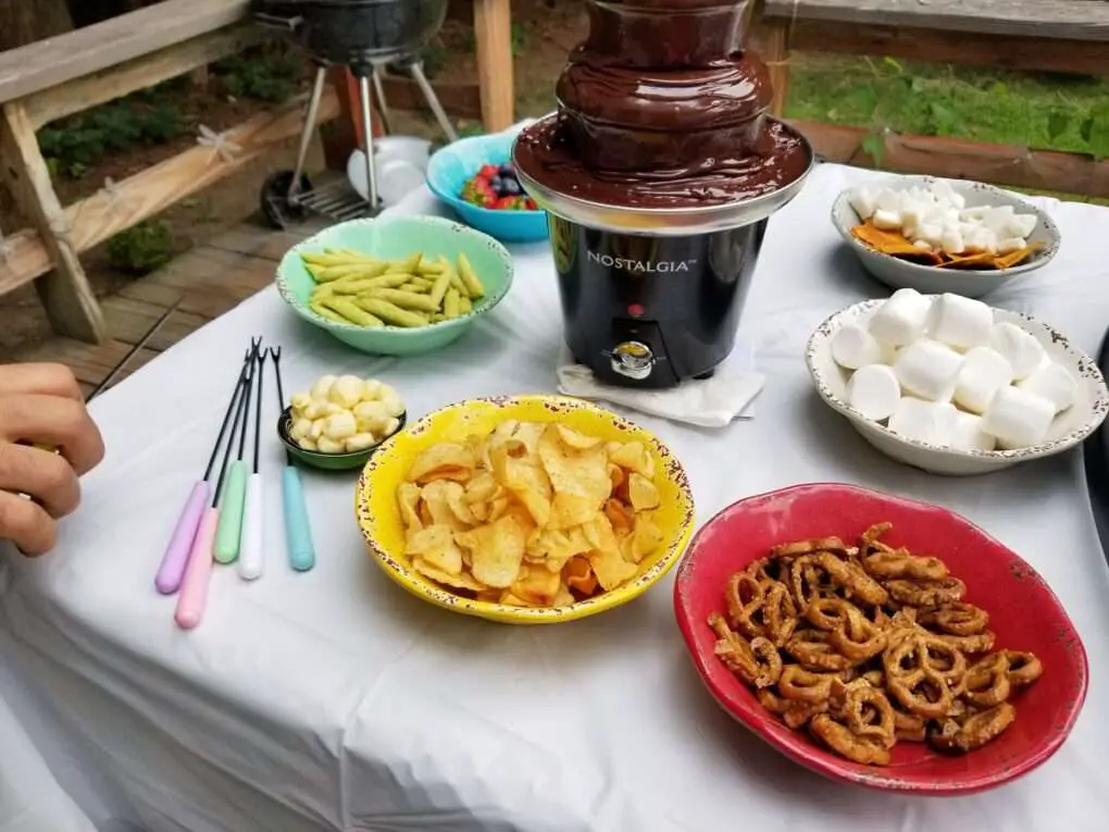 chocolate fondue, marshmallows and other treats for the 1960s Hippy Day