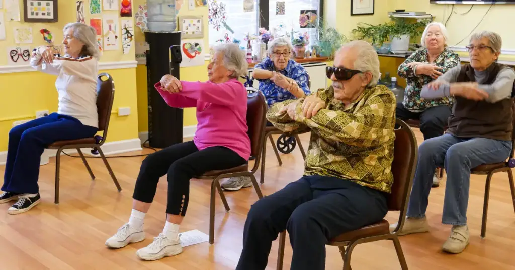 Seniors doing warm up exercises