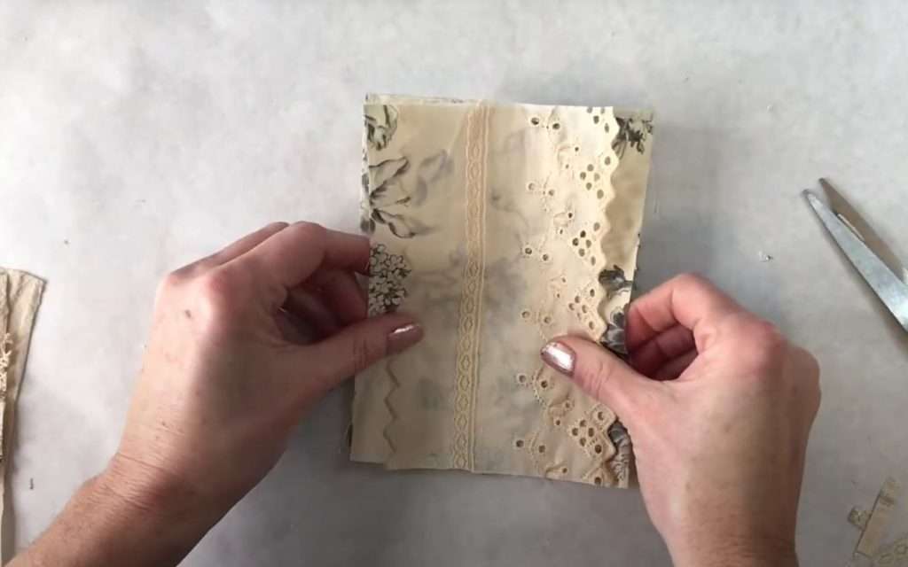applying glue to fabric square