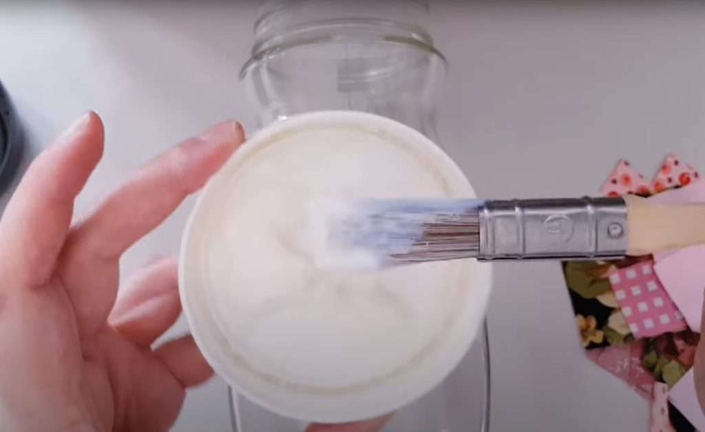 applying glue to a jar