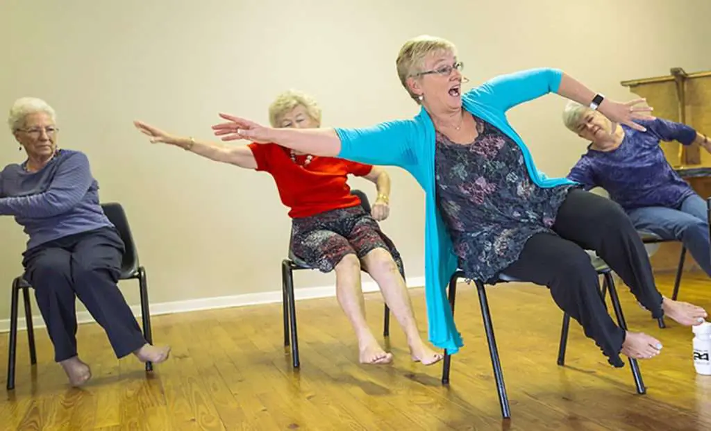 seniors in aged care doing Seated Dancing Exercise