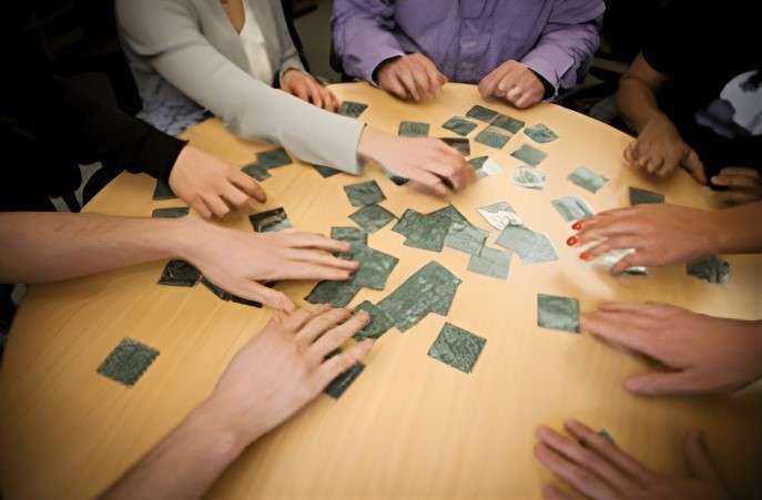 players shuffling the cards