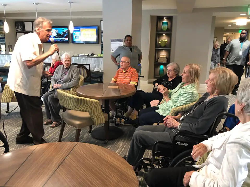 Senior man taking in front of aged care community