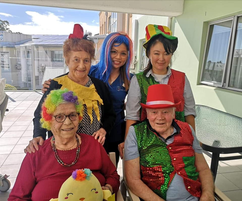 aged care seniors and staff dressed up for April Fools