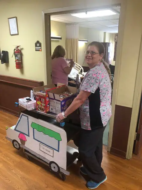 aged care staff with snack cart
