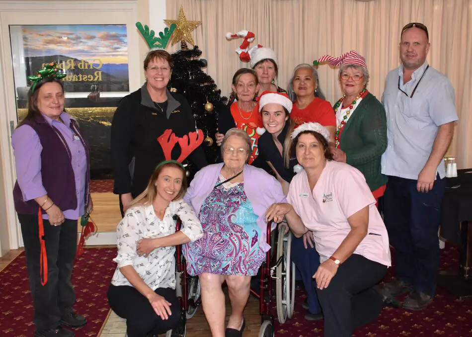 Aged care group photo during Christmas Reminiscing Questions Activity