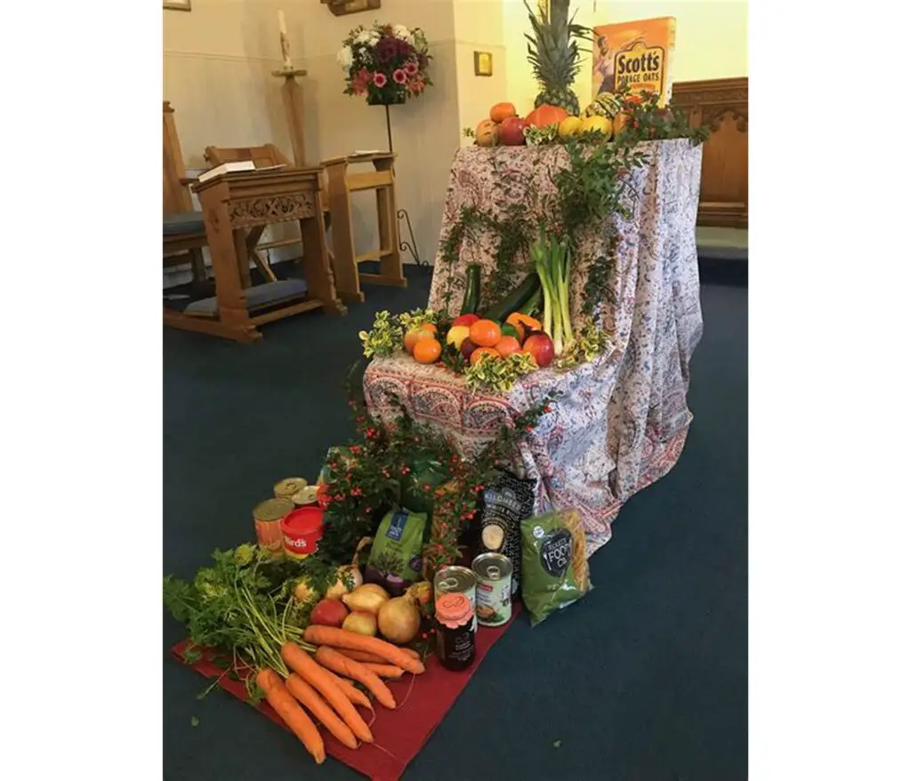 Fruits and vegetable crops are decorated inside the venue