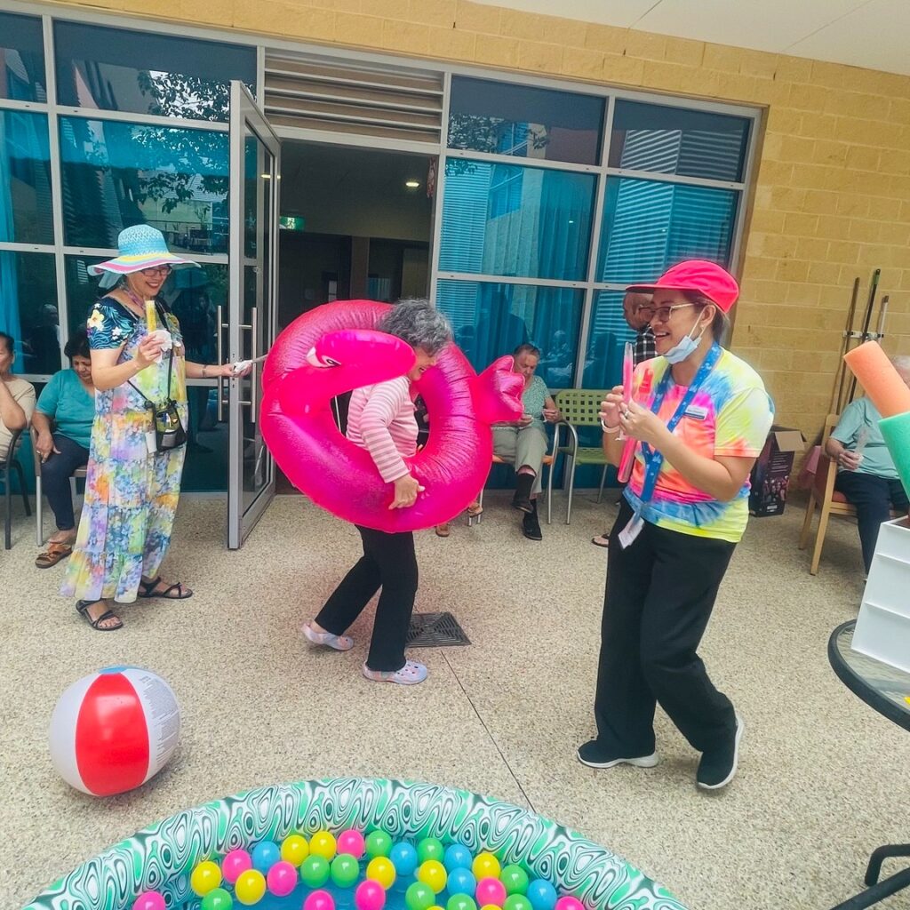 Seniors enjoying pool party