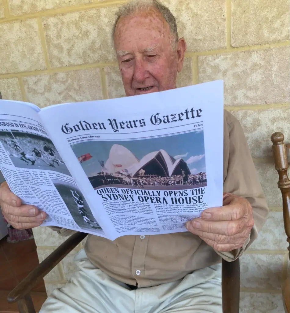 Grandpa reading reminiscing newspaper