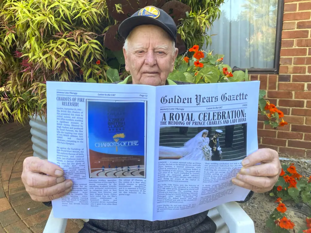 Grandpa reading reminiscing newspaper