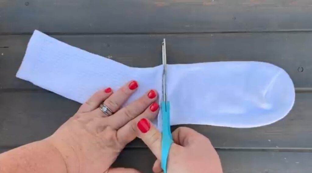 Cutting white sock for craft