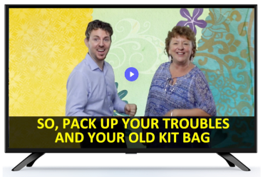 Television screen showing two people singing with on-screen lyrics during a sing-along session