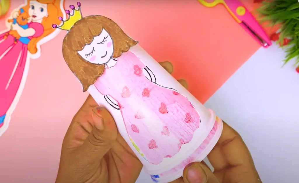 rotating paper cup doll
