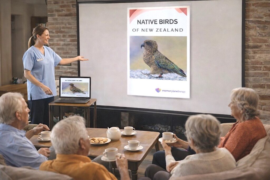 an aged care staff member is projecting the A4 Native birds image onto a screen in front of a senior audience